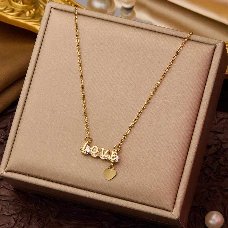 Gold LOVE Script Necklace with Floating Heart – Zirconia Accented Pendant